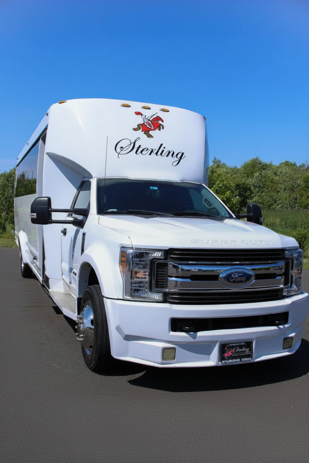 316 LImo Bus front view day with blue sky