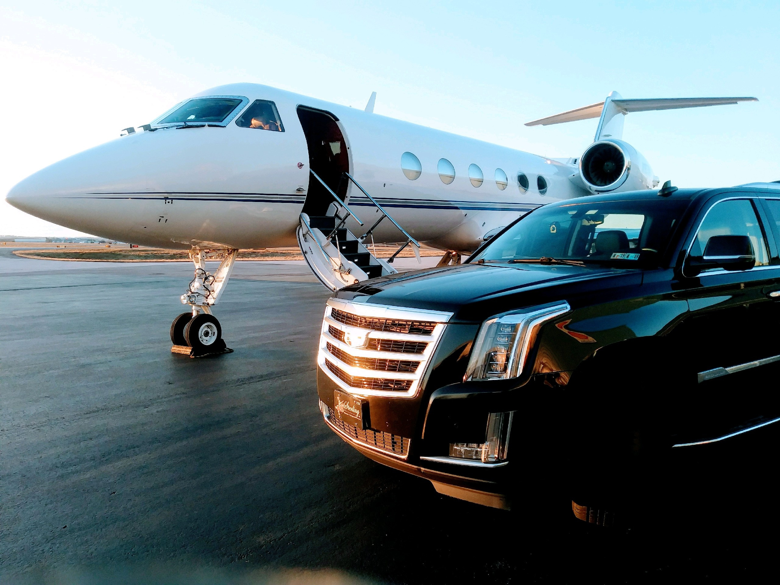 Cadillac Escalade and Private Aviation Plane