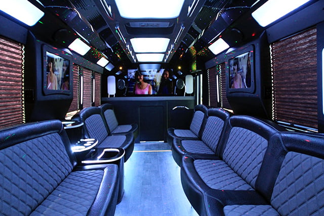 Interior of party bus with wrap around seating