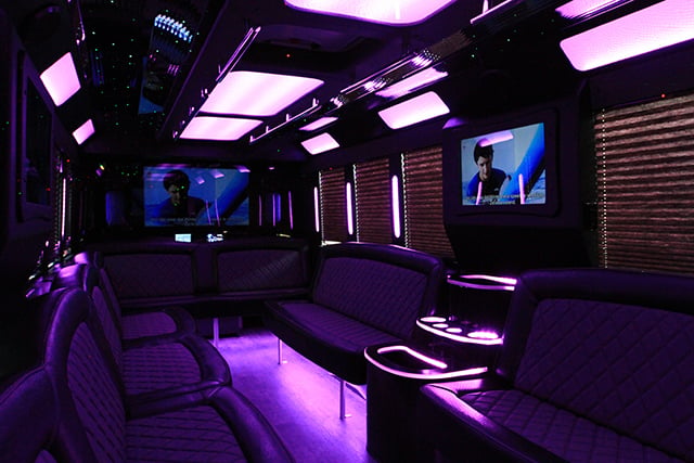 Interior party bus with pink LED lights