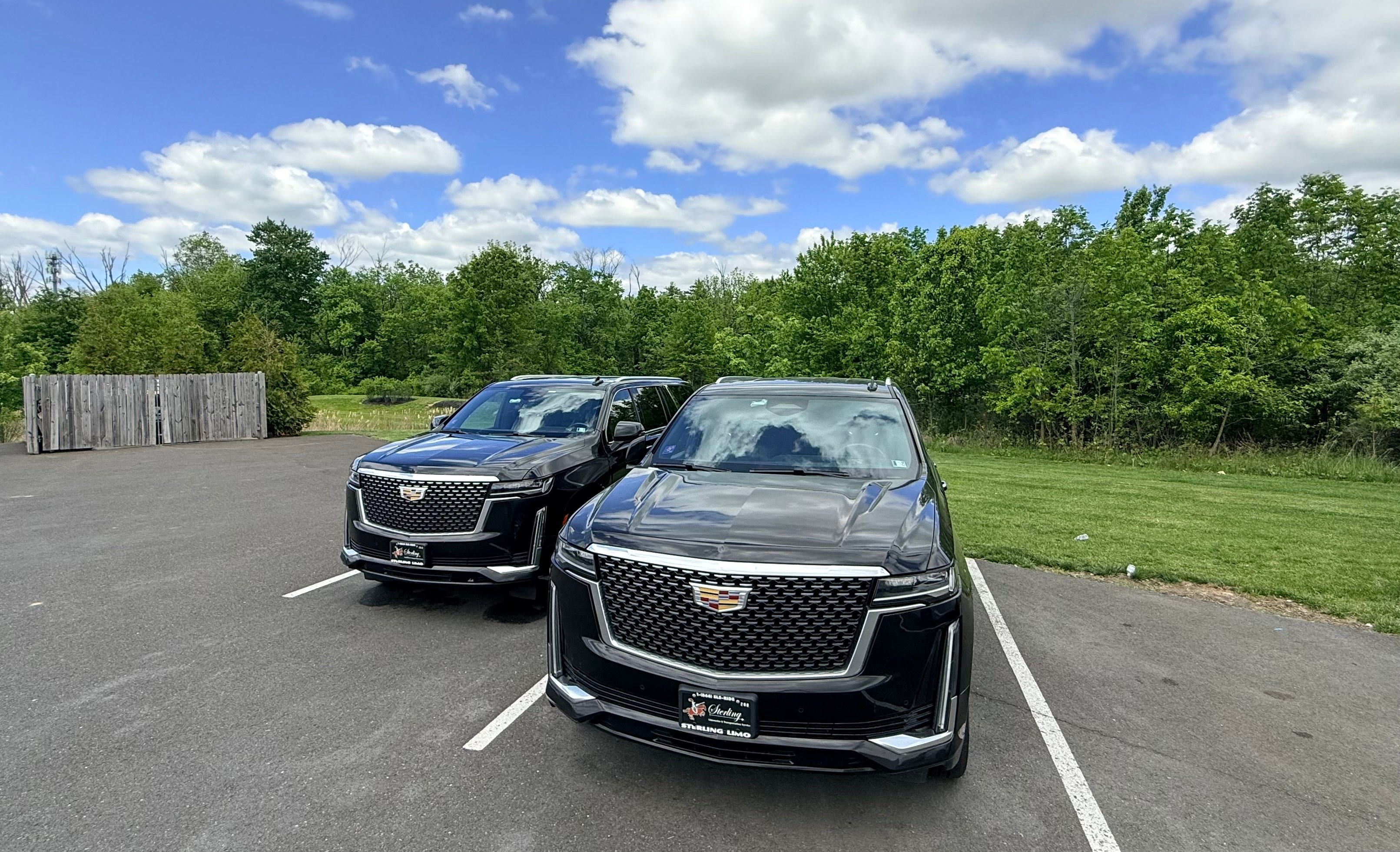 Two Escalades on the lot