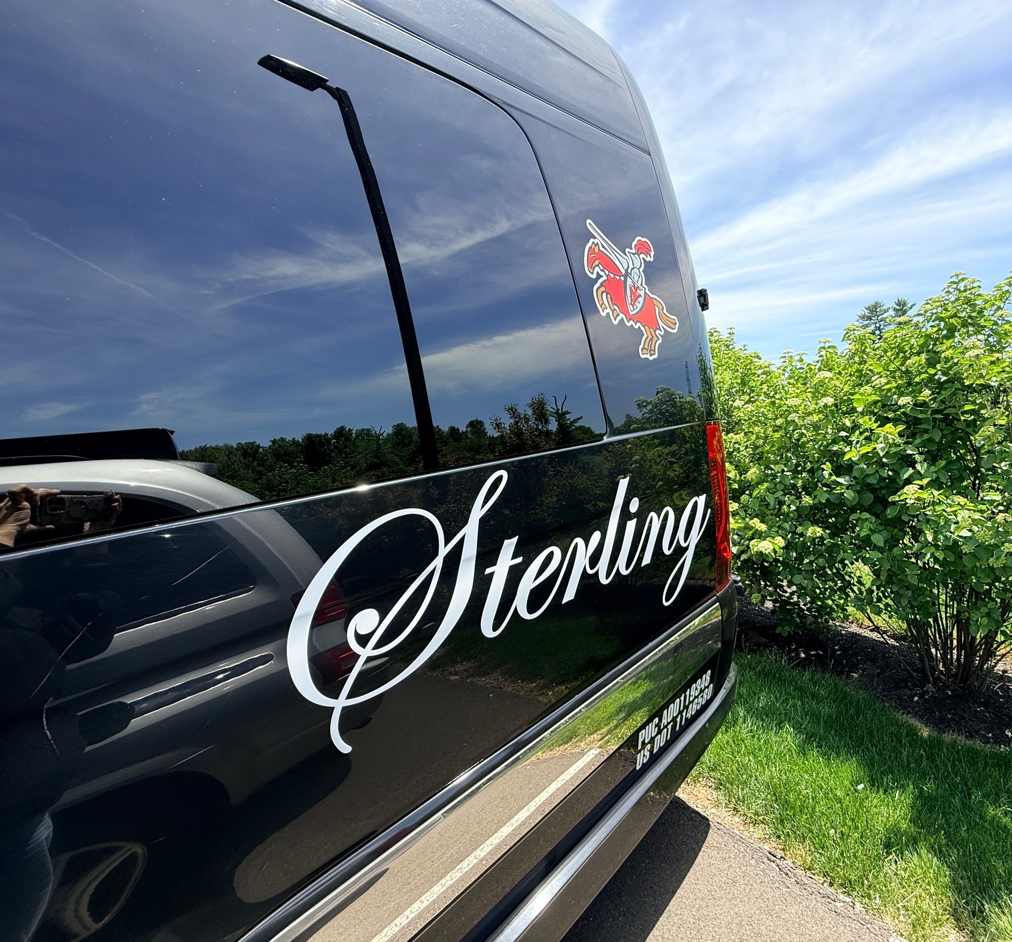 Driver side rear exterior with Sterling Limousine logo