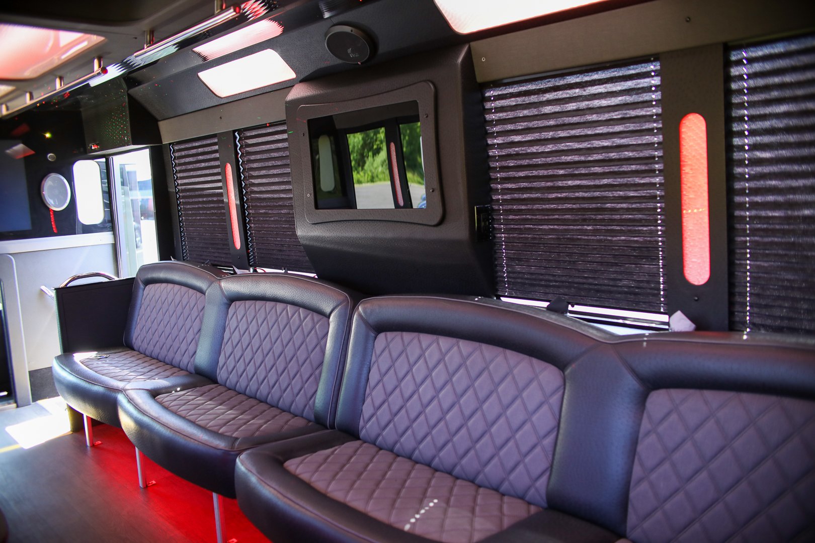 Interior of party bus with red lights