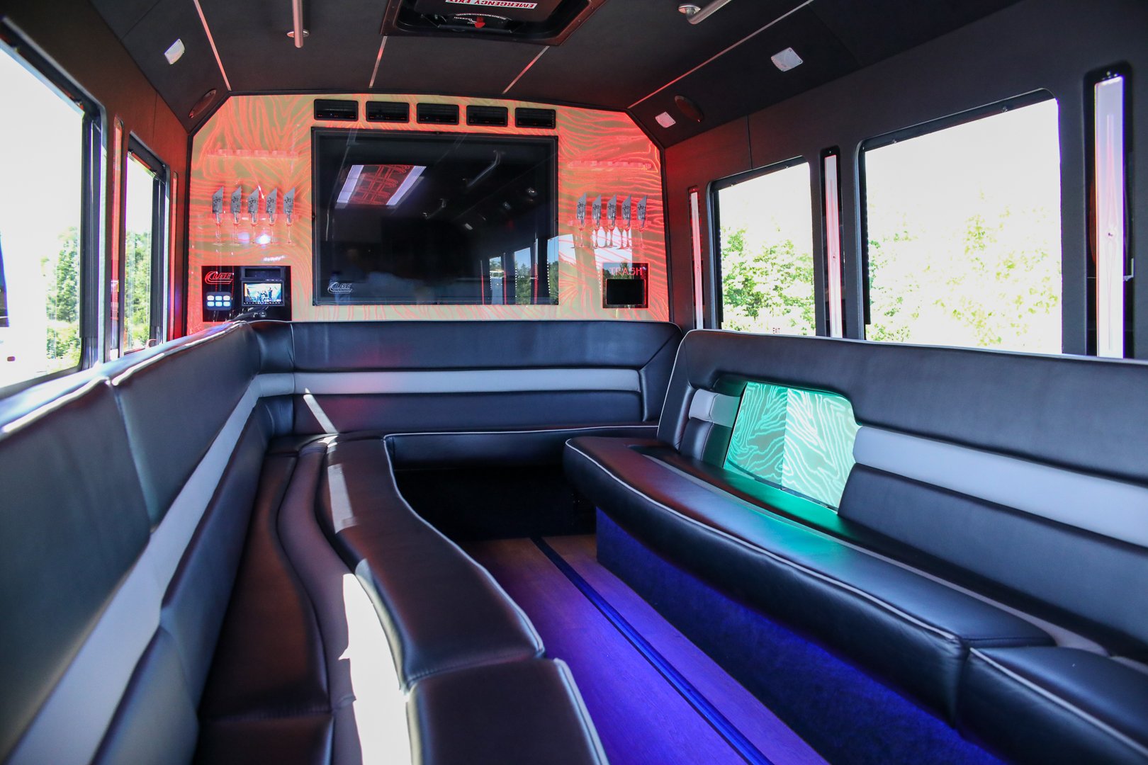Limousine Party Bus with Red LED Back Wall