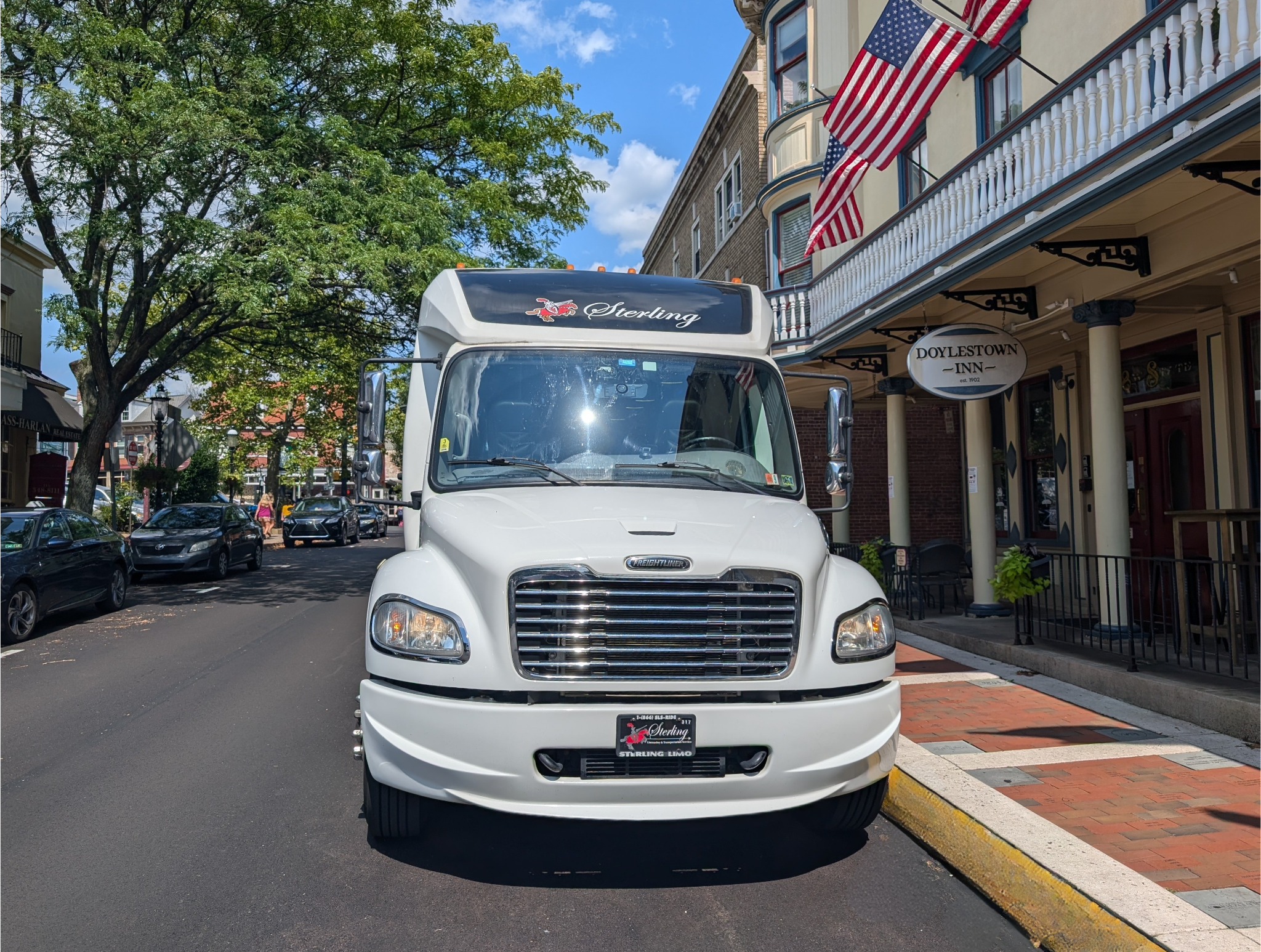 White mini bus Doylestown Inn - day