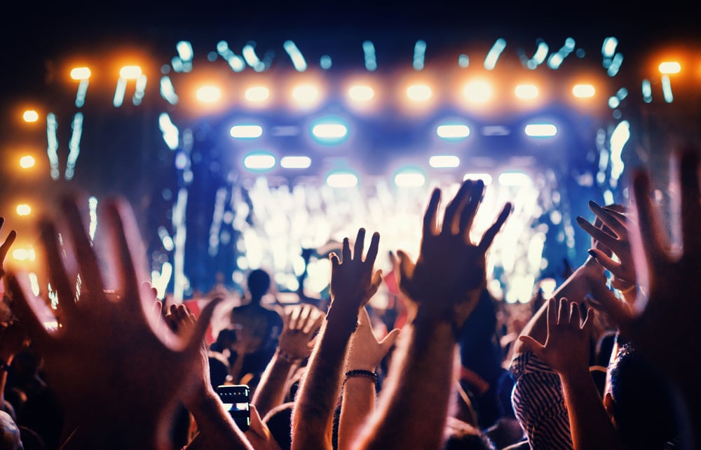 Hands up at a concert