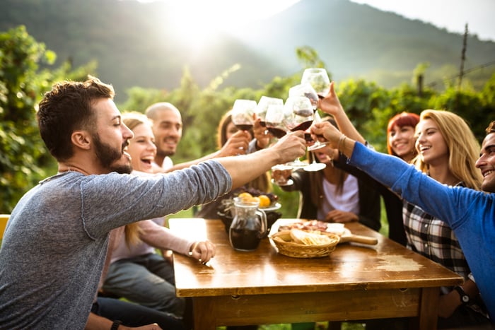 Group toasting wine at a winery lunch