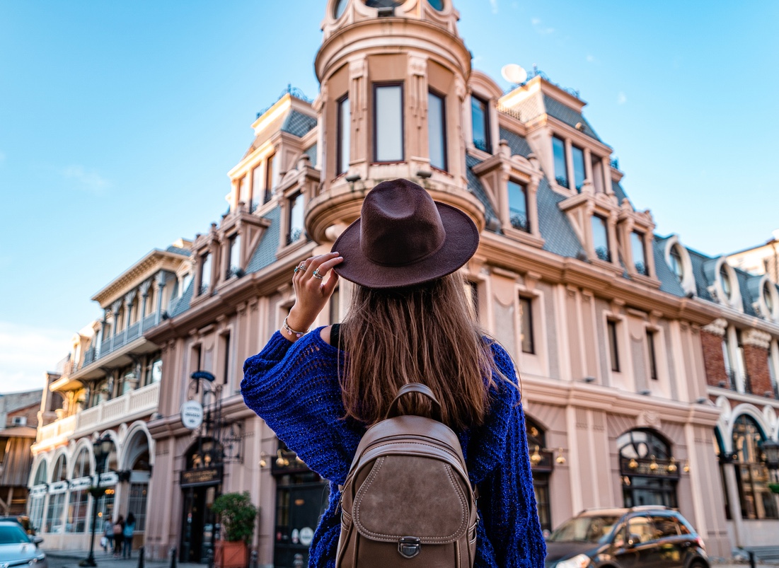 Stock International Travel Woman with Hat